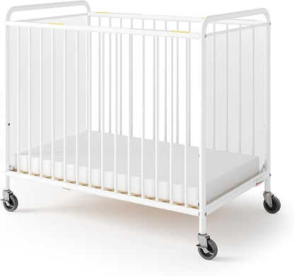Foundations Chelsea Clearview Metal Compact Daycare Crib, 3" Casters, Compact Mini Size, Easy to Clean Durable Finish, Adjustable to Two Heights Mattress Board (White)