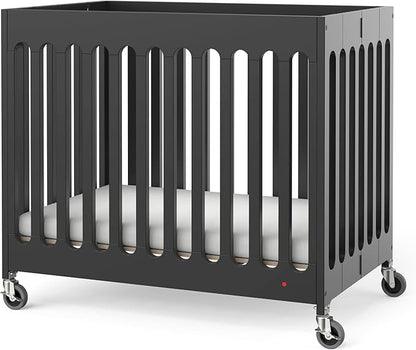 Foundations Boutique Folding Mini Baby Crib - Compact, Portable, Wooden Hotel Crib, Foldable Mini Crib for Baby & Toddlers - Includes 3" Foam Mattress, Ebony