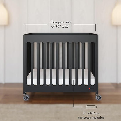 Foundations Boutique Folding Mini Baby Crib - Compact, Portable, Wooden Hotel Crib, Foldable Mini Crib for Baby & Toddlers - Includes 3" Foam Mattress, Ebony