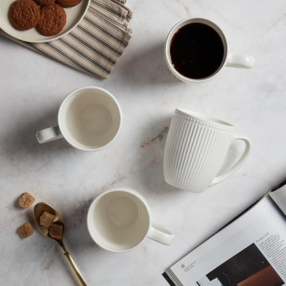 Tabletops Gallery 4 Piece Embossed White Chip Resistant Porcelain Mug Set |